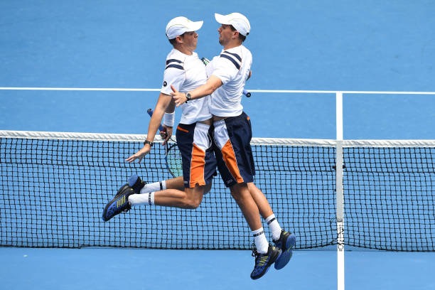 Bryan Brothers chest bump